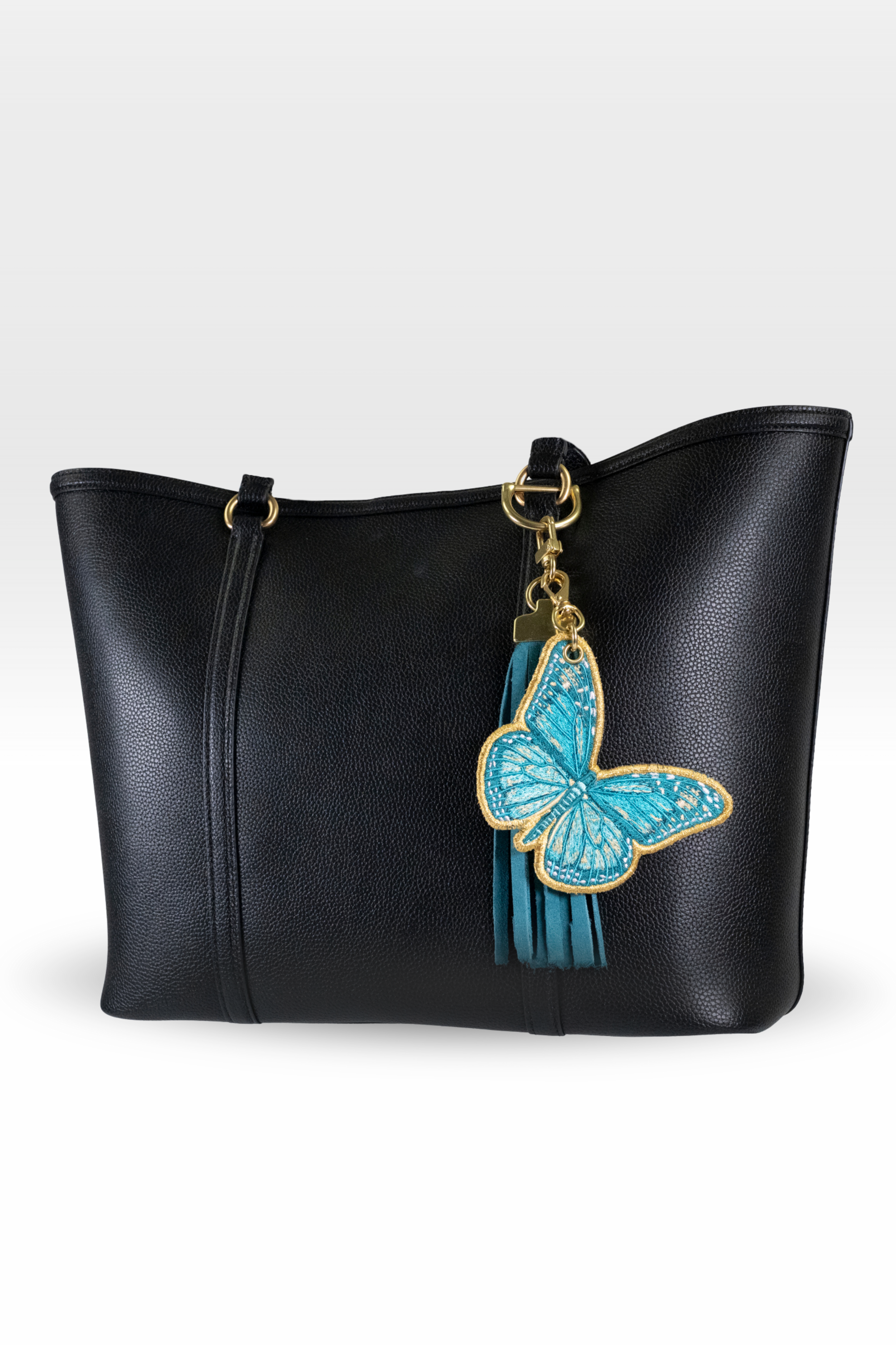 Monarch with Teal Tassel Stack