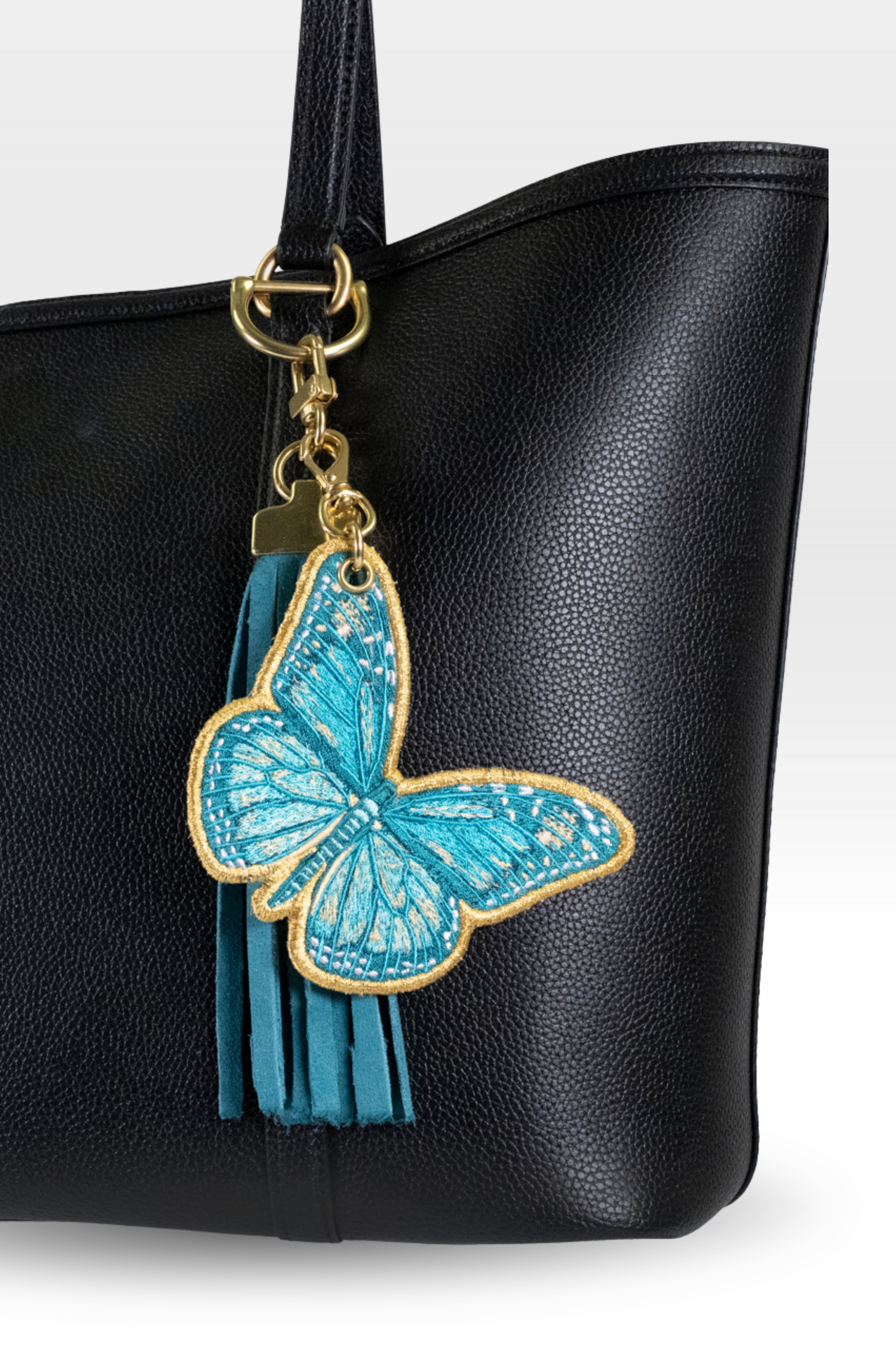 Monarch with Teal Tassel Stack